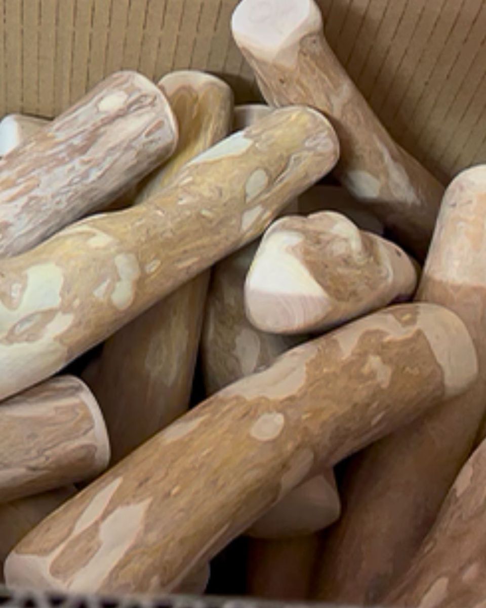 Finished coffee wood dog chews packed in an export carton